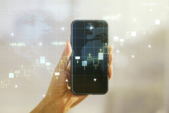Multi exposure of abstract financial graph with world map and hand with mobile phone on background, financial and trading concept - Powered by Adobe