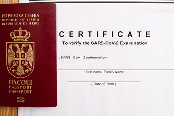 Serbian passport with the SARS-CoV-2 (Covid-19) examination results.