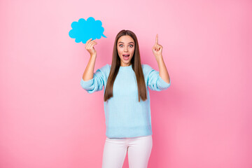 Excellent Photo of pretty crazy lady hold paper mind cloud raise finger have creative clever idea wear knitted blue pullover white trousers isolated pastel pink color background