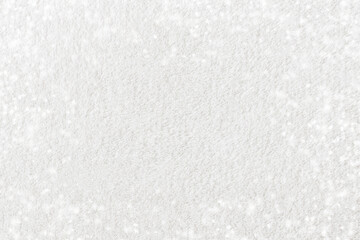 The background image is soft white fur. Christmas texture background. New Year