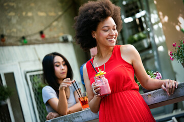 Group of friends having fun together. People talking laughing and enjoying their time