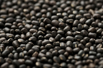 Black Gram or Urad Beans or Mung Beans texture. Vigna Mungo is popular indian cuisine food ingredient.