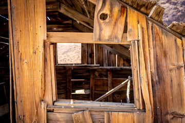 Fototapeta na wymiar old abandoned wooden house in a ghost mining town