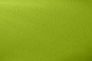 Colorful green fabric texture as background. Beautiful green fabric texture close-up