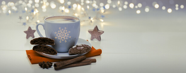 Obraz na płótnie Canvas Christmas chocolate Cookies with garland and coffee cup.