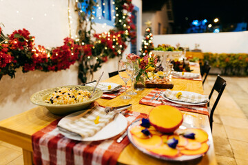Brazilian Christmas. Table set for Christmas dinner in the backyard.