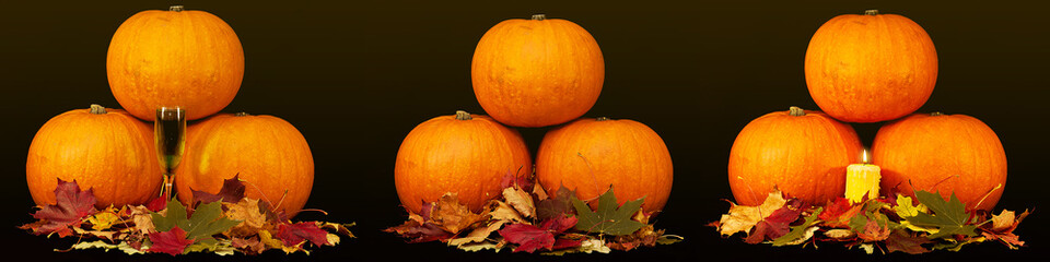 A trio of pumpkins against a black background