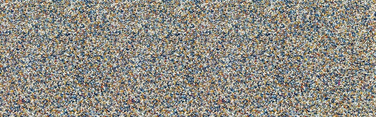 Panorama of Multi Color Pebble Stone Wall Tiles texture and seamless background