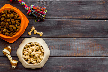 Set of dog food and toys. Pet food background, top view