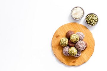 Raw coconut and chocolate energy balls, top view