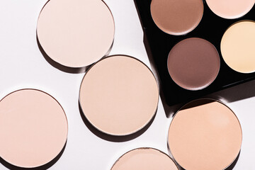 top view of contour palette and face power on white background