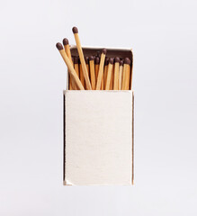 Single retro matchbox isolated on white background