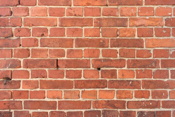 Old brick wall in daylight.