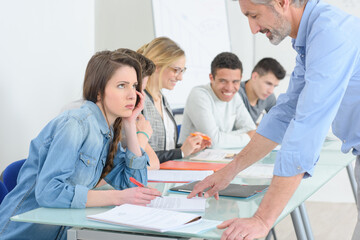 Fototapeta premium a few students in a classroom