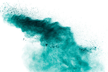 Abstract green powder explosion on white background.Freeze motion of green dust cloud.