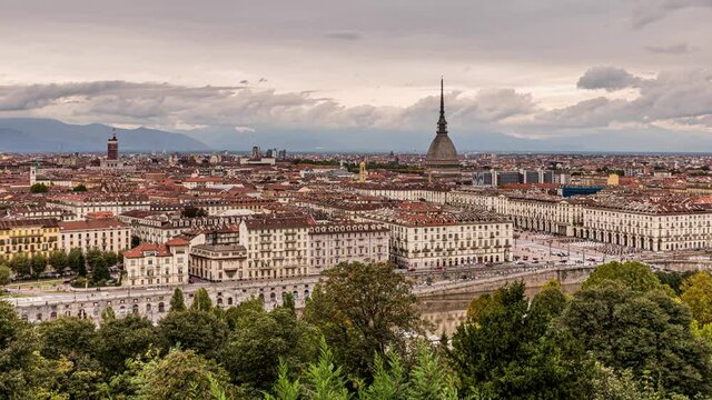 Turin, Italy. October 4th, 2020. Zoom time lapse of a generic afternoon view of the city of Turin with the dome of the Mole, the traffic of Piazza Vittorio Veneto and the Vittorio Emanuele I bridge.
