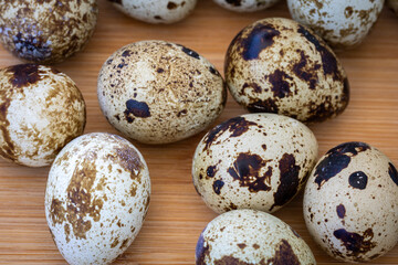 quail eggs on a wooden board