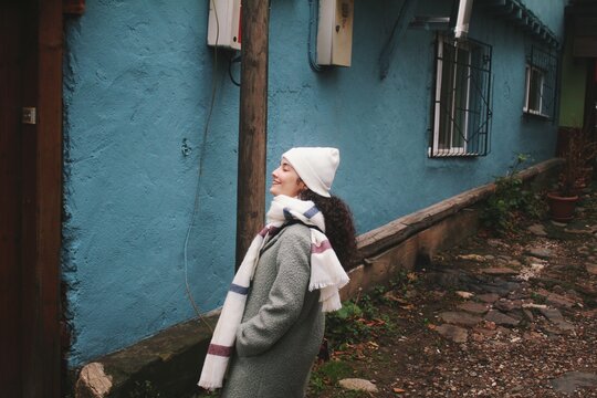 Young woman enjoying being out in the streets walking freely alone