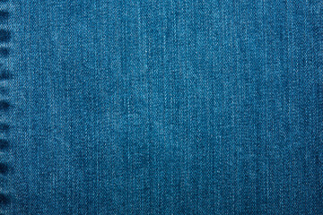 Texture of dark grated denim as background. Close-up