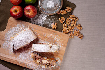 .Traditional apple strudel with nuts. Top view. Copy space