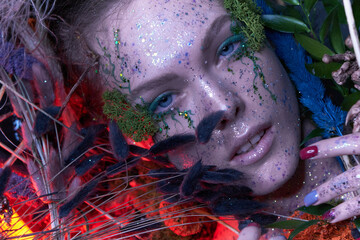 Young beautiful sad woman in the image of the fairy