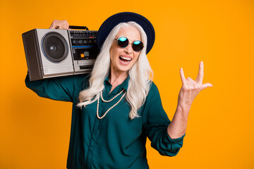 Photo of cool crazy granny lady music lover senior party tape recorder shoulder showing rock horns...