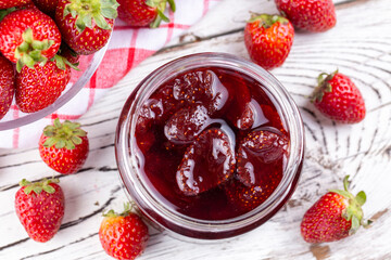 Homemade delicious strawberry jam and fresh strawberry