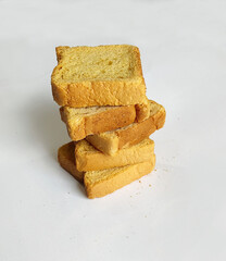 crispy rusk, cake rusk, cardamom rusk, Crunchy or Toast for healthy life, Traditional biscuit tray with tea, toasts for breakfast and cup of fresh milk & Tea, dry toasty bread, crunchy toast, pau,