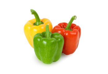 Red, green and yellow bell peppers isolated on white background.