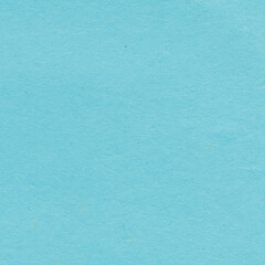 Blue torn paper collage close-up. Texture made from various paper and cardboard parts. Damaged old paper background. Vintage blank wallpaper. Material design backdrop.