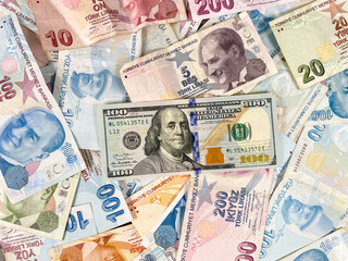 Turkish Liras and one hundred American Dollar. Turkish lira depreciates against the US dollar