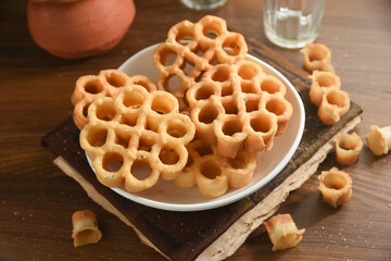 Rose Cookies or Achu Murruku Achappam  achapum, puvvulu, rosette cookie Anglo Indian cookie Indian Christians christmas, rice flour,   Kerala South India Traditional Malaysian, Indonesian and Brunei 
