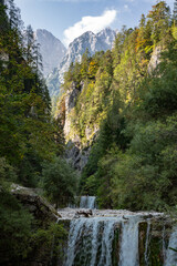 Fototapeta na wymiar Martuljek river with small waterfalls, Gozd Martuljek, Slovenia