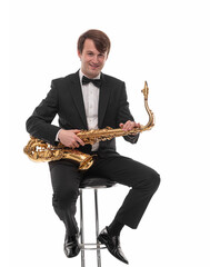 Saxophonist with a saxophone in his hands on a white background.