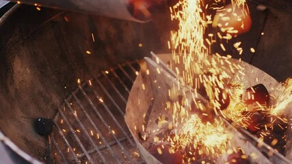 Charcoal lit in a barbecue grill