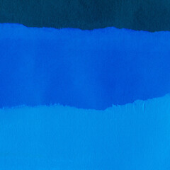 Blue torn paper collage close-up. Texture made from various paper and cardboard parts. Damaged old paper background. Vintage blank wallpaper. Material design backdrop.