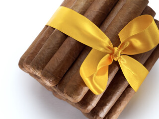 Close up view of bunch of cigars on white back