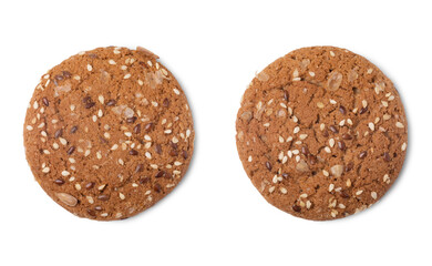 Top view of two different oatcakes with sunflower and flax seeds isolated on white background.