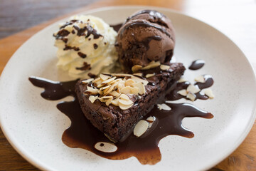 Chewy Dense Brownie  Our House Brownie with italian chocolate ice cream and Whipped Cream.