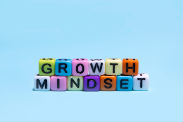 growth mindset concept , message on color cube