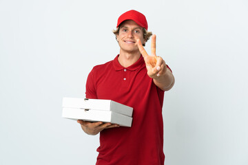 pizza delivery man over isolated white background smiling and showing victory sign