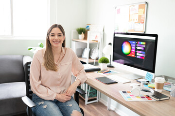 Cute freelance designer in her office