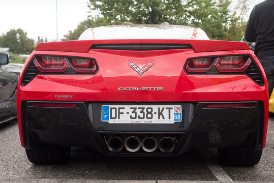 Mulhouse - France - 11 October 2020 - Rear view of red chevrolet Corvette in the street