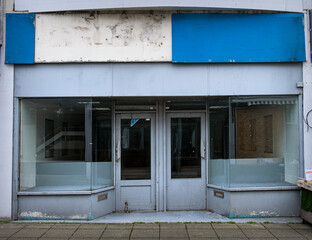 Shops closed and empty depicting the dying high street in the UK.