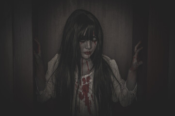 Portrait of asian woman make up ghost,Scary horror scene for background,Halloween festival concept,Ghost movies poster