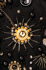 Golden flower embroidery with crystal beads around