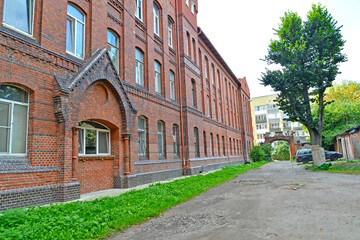 Fototapeta na wymiar A fragment of the brick building of the Lebenikht hospital (1903). Kaliningrad