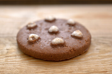 Chocolate cookies isolated on wood background