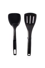 Black plastic kitchen spatula and spoon isolated on white background	