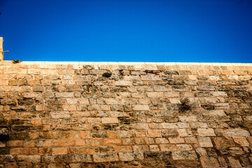 Close up of The Western Wall, Wailing Wall, often shortened to The Kotel is the most religious site...